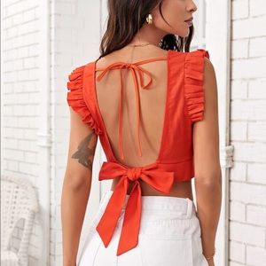 Backless orange crop top